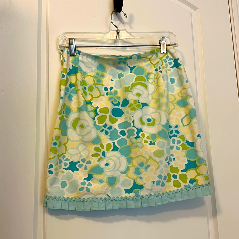 Ann Taylor size 2P spring colored a-line skirt with pleated detail.